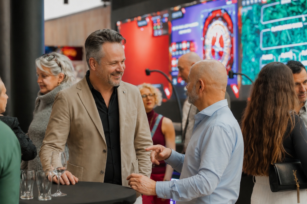 Business professionals networking at an event